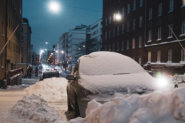 Car buried in snow after record snowfall