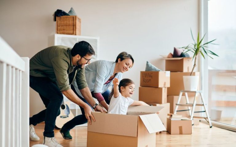 family playing with boxes