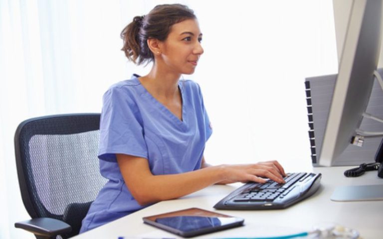 nurse working at desk