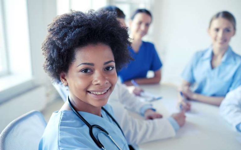 nurse smiling at camera