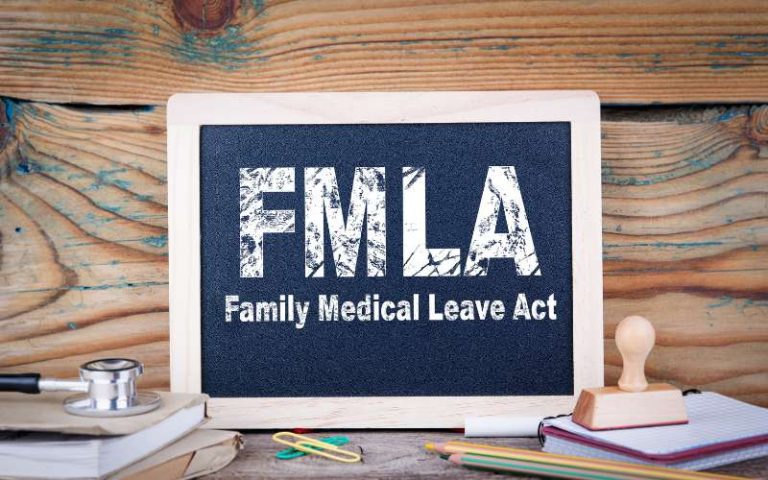 Family medical leave act written on chalkboard