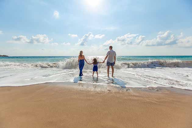 family on beach vacation